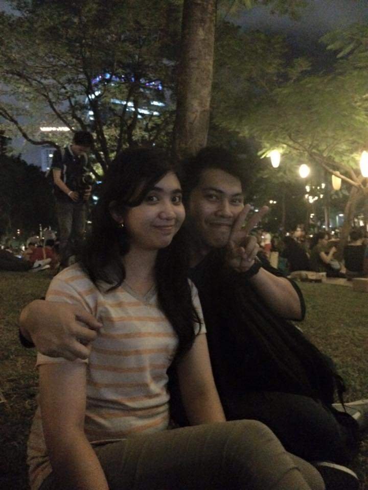 Gerald and Edin at a park at night