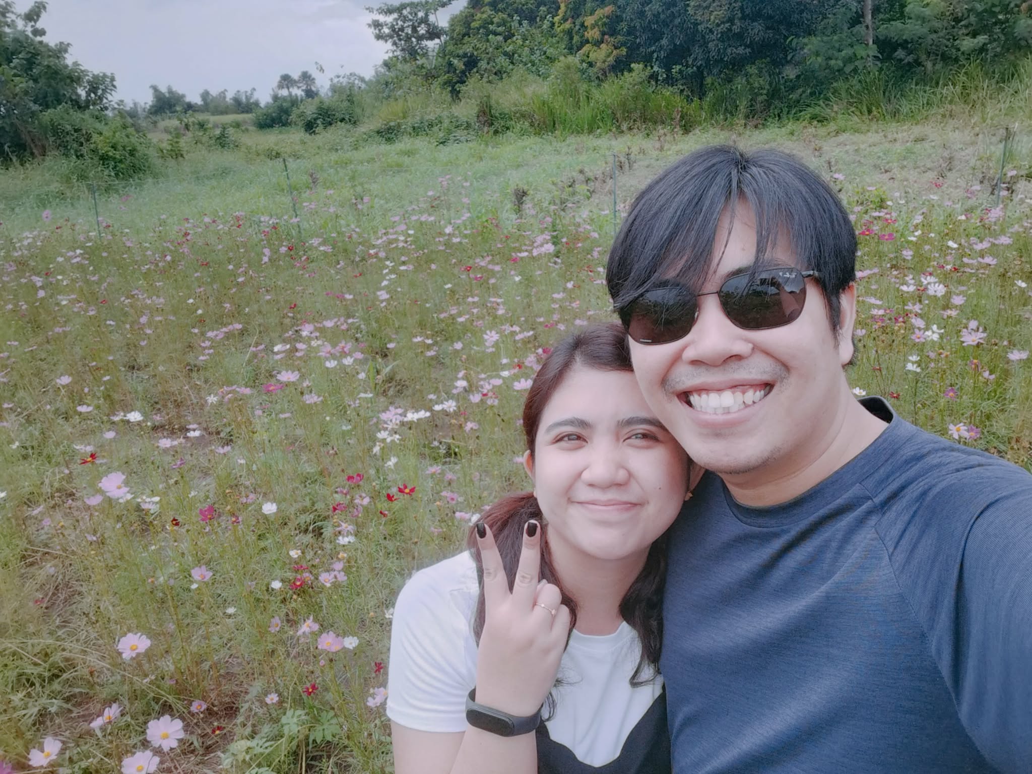 Gerald and Edin in a cosmos flower field