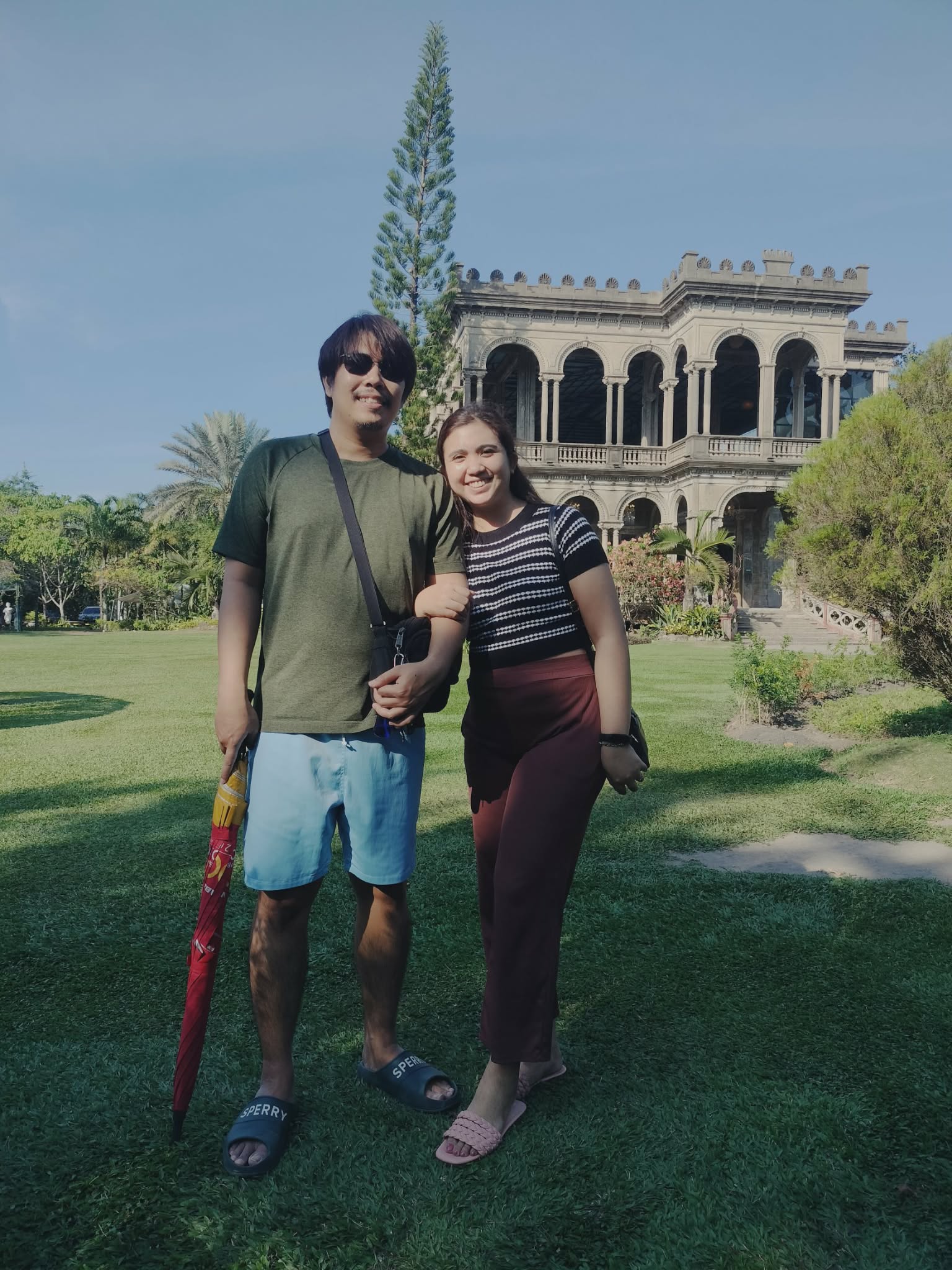 Gerald and Edin in front of The Ruins mansion in Talisay