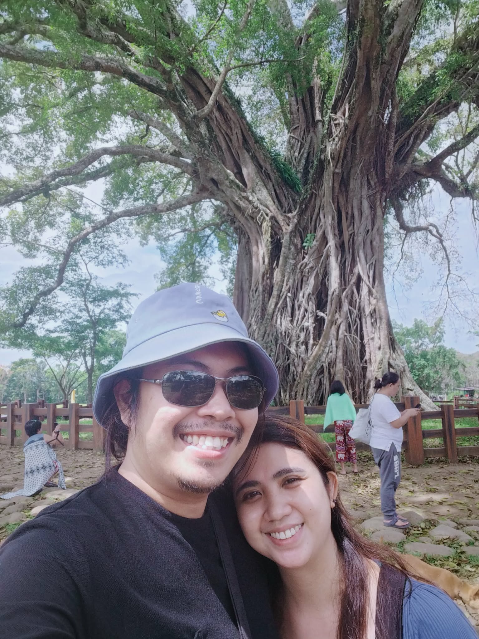 Gerald and Edin in front of a giant balete tree